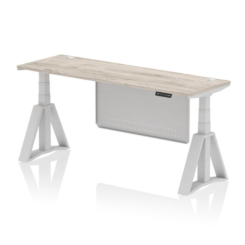 air height adjustable slimline desk with cable ports with steel modesty panel with piste foot